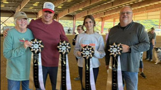 Winners holding their ribbons for the November 2025 NADAC trial